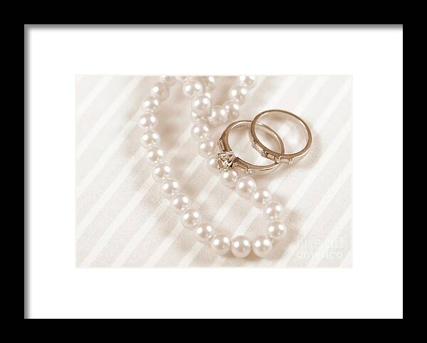 Card Framed Print featuring the photograph Wedding and diamond engagement rings with pearl necklace by Milleflore Images