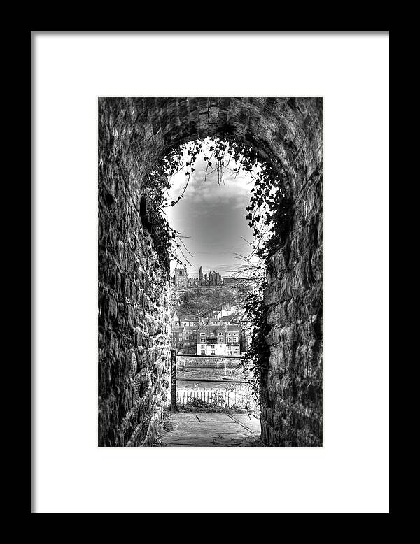 Whitby Abbey Framed Print featuring the photograph Whitby Abbey Through The Keyhole by Paul Thompson