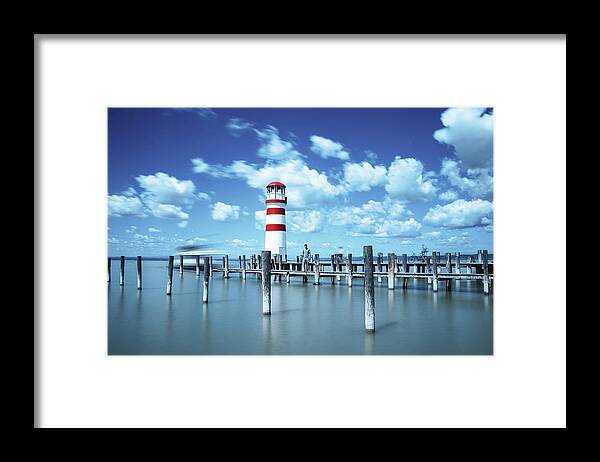 Destinations Framed Print featuring the photograph White-red lighthouse in Podersdorf am See by Vaclav Sonnek