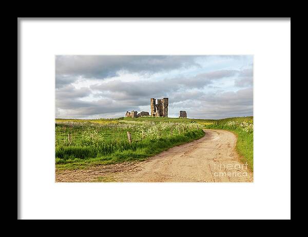 British Framed Print featuring the photograph Winding road leading to a chirch ruin in Norfolk by Simon Bratt
