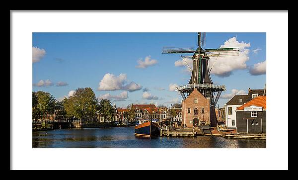 Tf-photoscapes Framed Print featuring the photograph Windmill in Haarlem Holland by Tommy Farnsworth