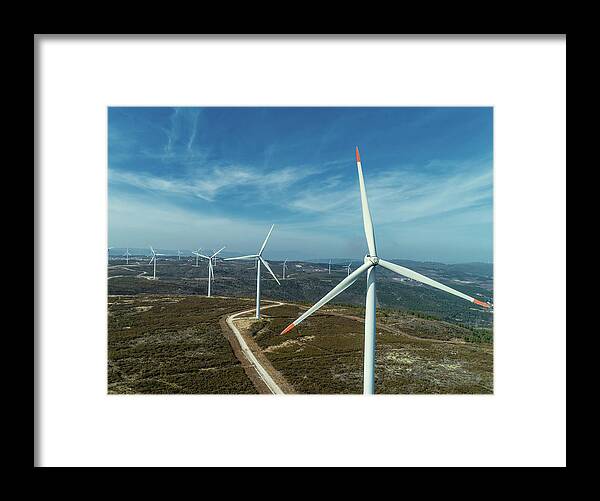 Wind Framed Print featuring the photograph Windmills or wind turbine on wind farm by Mikhail Kokhanchikov