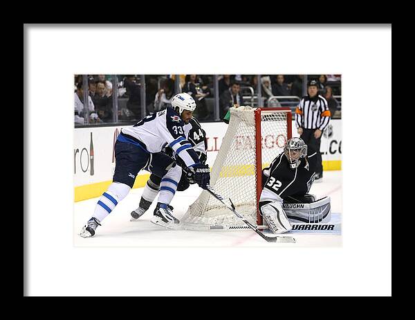 Dustin Byfuglien Framed Print featuring the photograph Winnipeg Jets v Los Angeles Kings by Stephen Dunn