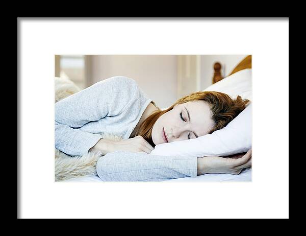 People Framed Print featuring the photograph Woman Asleep In Bed by Tara Moore