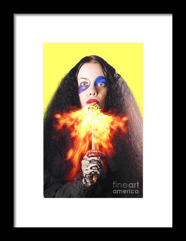 Fire Framed Print featuring the photograph Woman breathing fire from mouth by Jorgo Photography