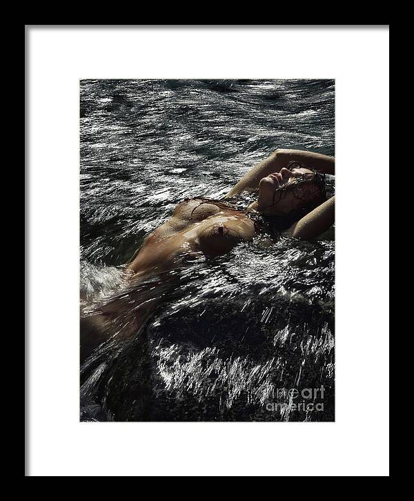 Woman lying naked in turbulent water of a river or sea her bare  by Awen Fine Art Prints