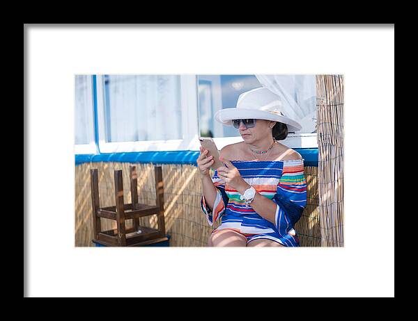 Amalfi Framed Print featuring the photograph Woman on a cafe in Capri Italy by Thepalmer
