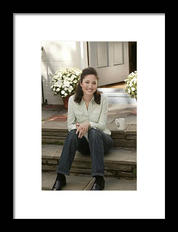 Steps Framed Print featuring the photograph Woman sitting on steps by Comstock Images