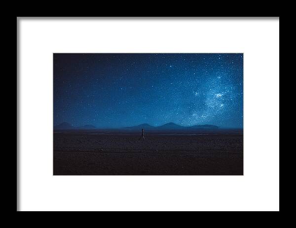 People Framed Print featuring the photograph Woman walks under the million stars and Milky Way in Atacama desert by Anastasiia Shavshyna