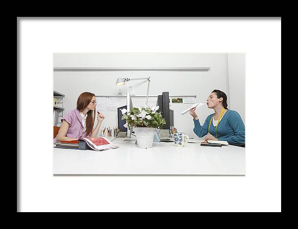 White People Framed Print featuring the photograph Women working in an office by Kris Ubach and Quim Roser