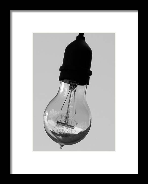 Light Framed Print featuring the photograph World IInside Lightbulb by Robert Wilder Jr