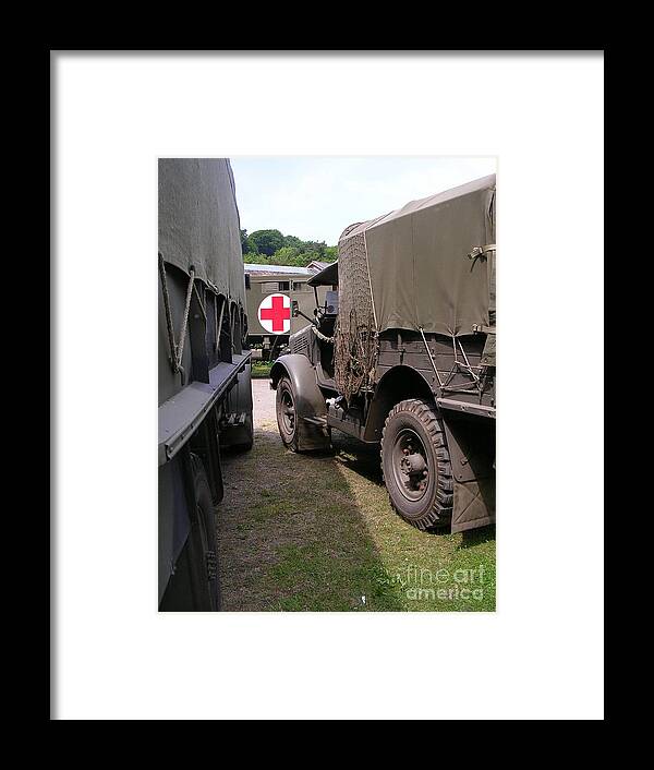 Military Trucks Framed Print featuring the photograph World War II Military Trucks by Lesley Evered