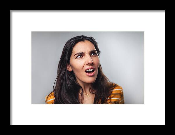 Problems Framed Print featuring the photograph WTF! Head shot portrait of shocked frustrated woman by Circle Creative Studio