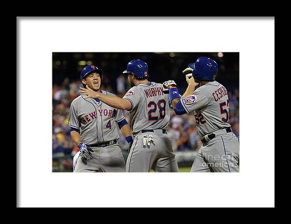 Yoenis Cespedes Framed Print featuring the photograph Yoenis Cespedes, Daniel Murphy, and Wilmer Flores by Drew Hallowell