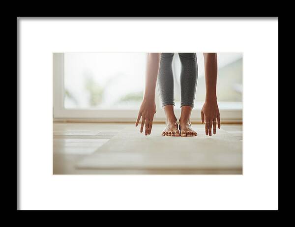 Tranquility Framed Print featuring the photograph Yoga can always be modified to fit people’s needs by PeopleImages