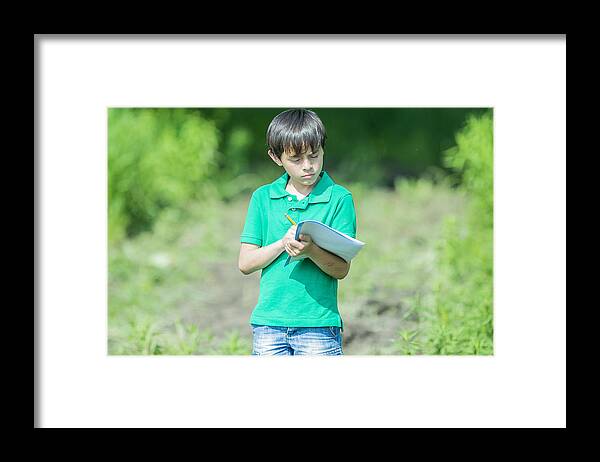 Education Framed Print featuring the photograph Young Researcher by FatCamera