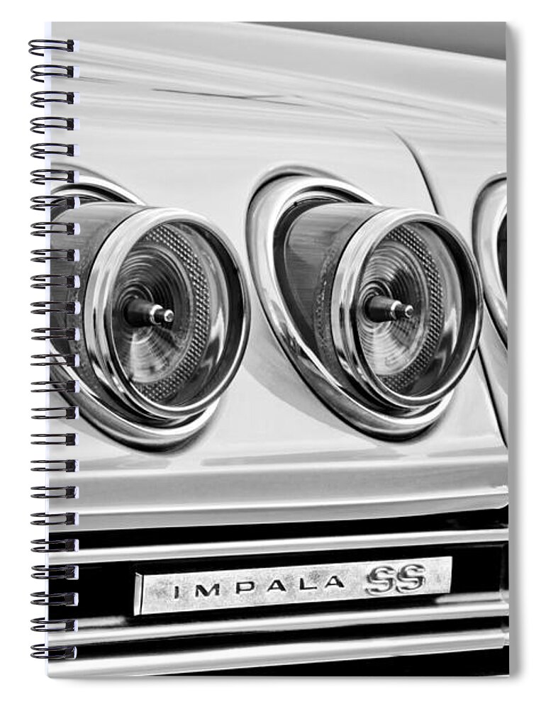 1965 Chevrolet Impala Ss Taillight Emblem Spiral Notebook featuring the photograph 1965 Chevrolet Impala SS Taillight Emblem by Jill Reger
