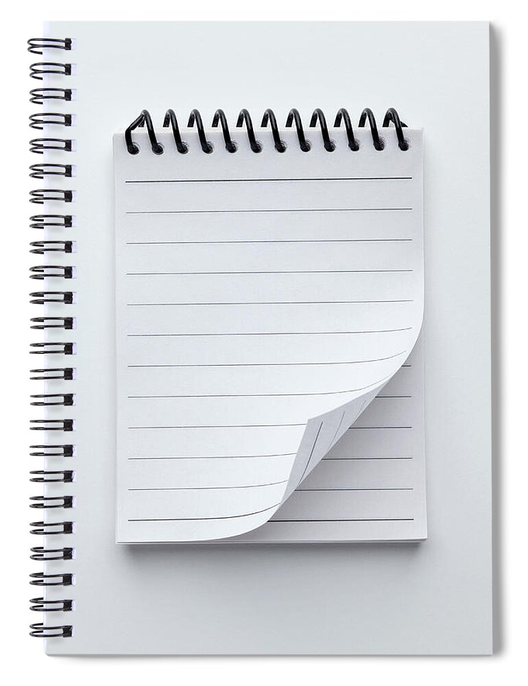 Shadow Spiral Notebook featuring the photograph A Spiral Notepad With Lined Paper And A #1 by Caspar Benson