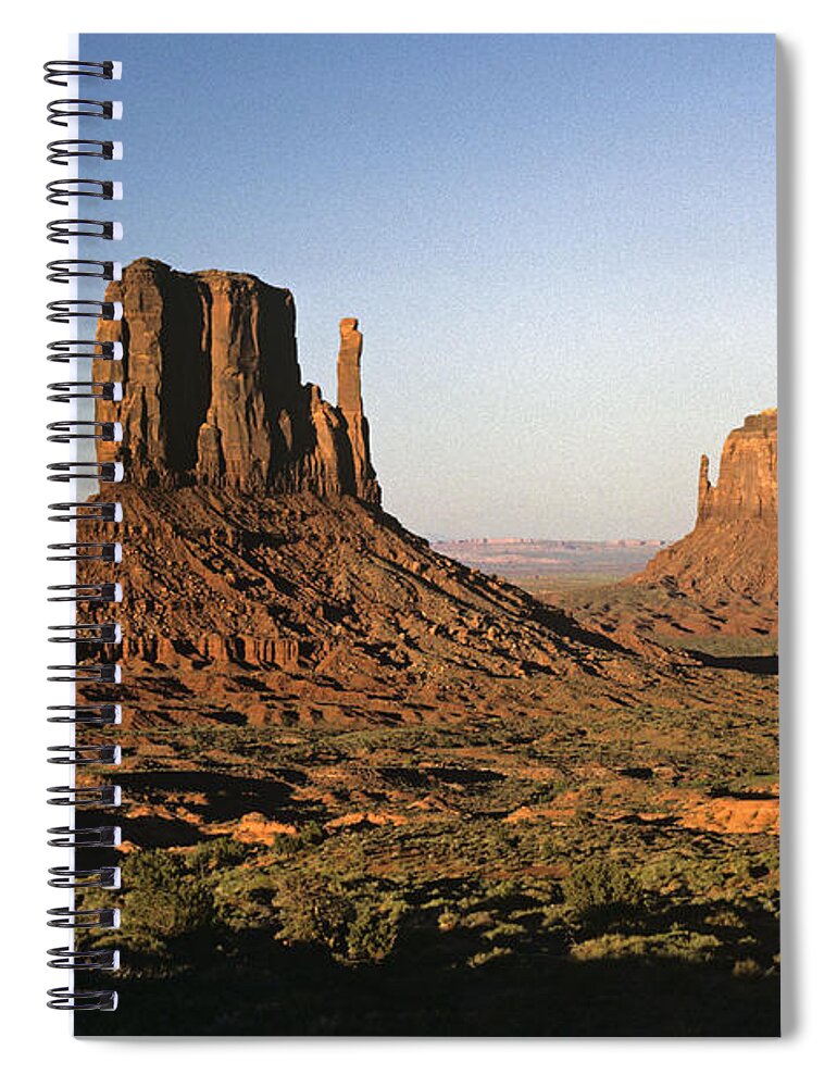 Arizona Spiral Notebook featuring the photograph Sunset light with Mittens and desert in Monument Valley Arizona #1 by Jim Corwin
