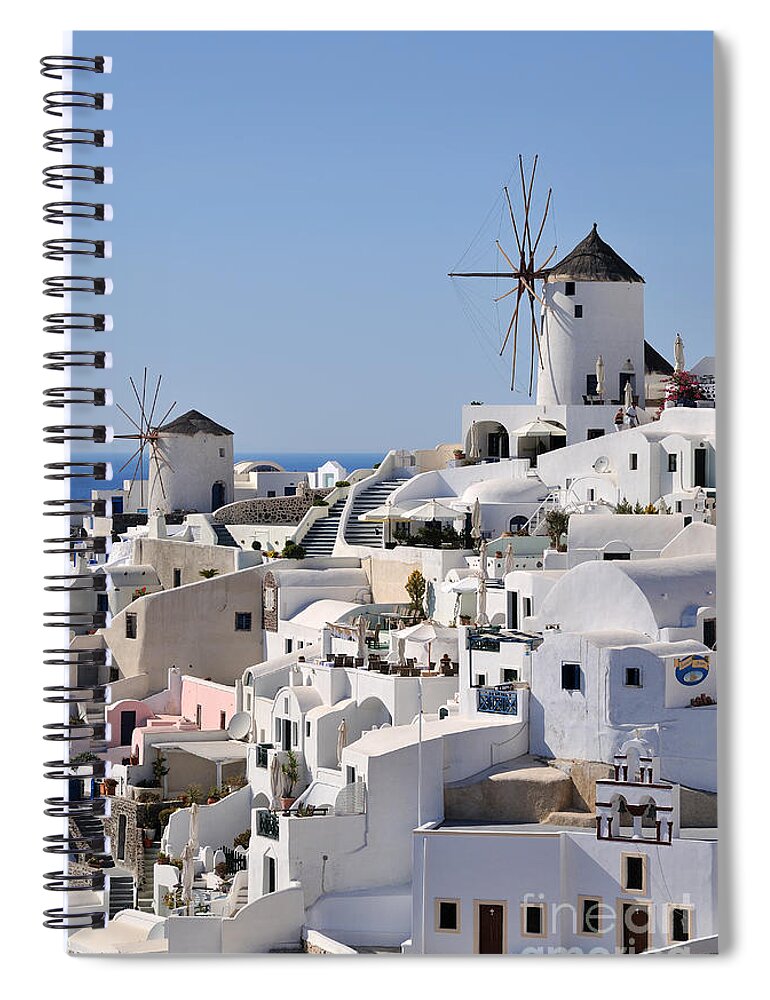 Santorini Spiral Notebook featuring the photograph Windmills and white houses in Oia #2 by George Atsametakis