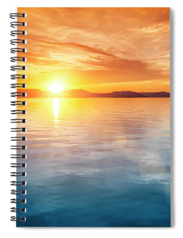 Scenics Spiral Notebook featuring the photograph Sunset Over Water #3 by Focusstock