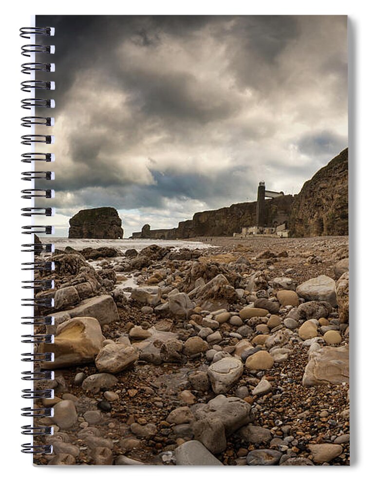 Water's Edge Spiral Notebook featuring the photograph A Rocky Beach Along The Waters Edge by John Short / Design Pics