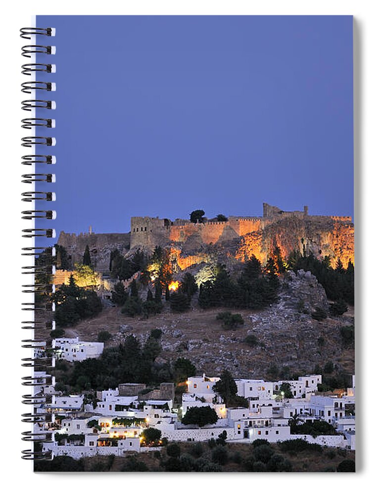 Rhodes Spiral Notebook featuring the photograph Acropolis and village of Lindos during dusk time by George Atsametakis
