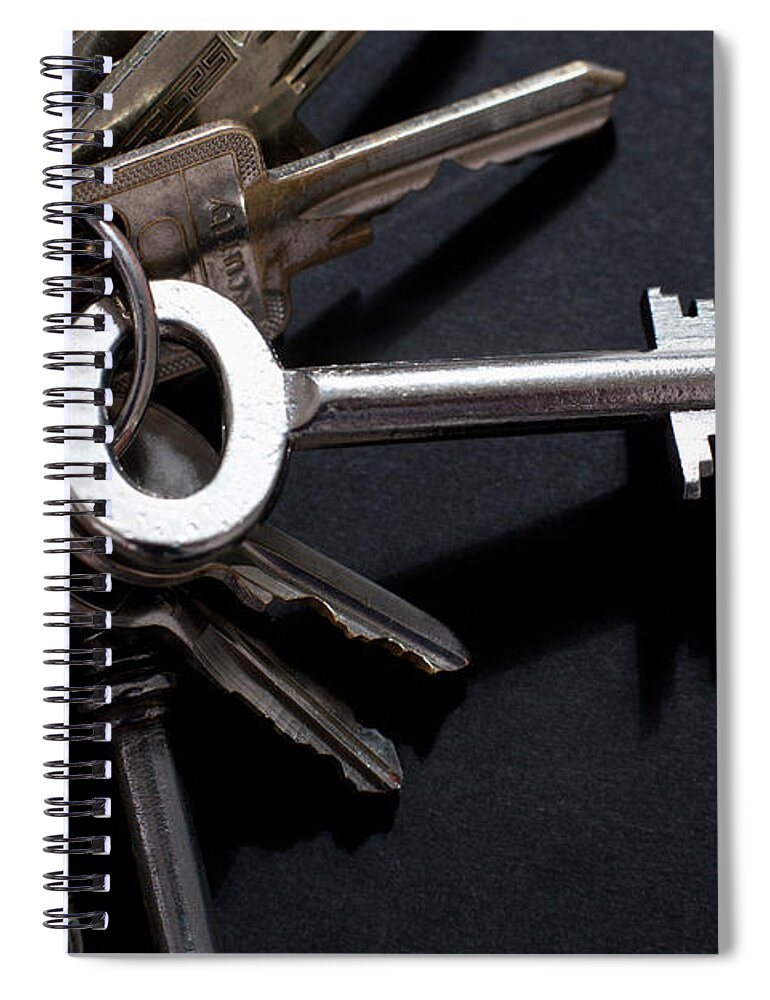 Security Spiral Notebook featuring the photograph An Odd Shaped Old-fashioned Key by Larry Washburn