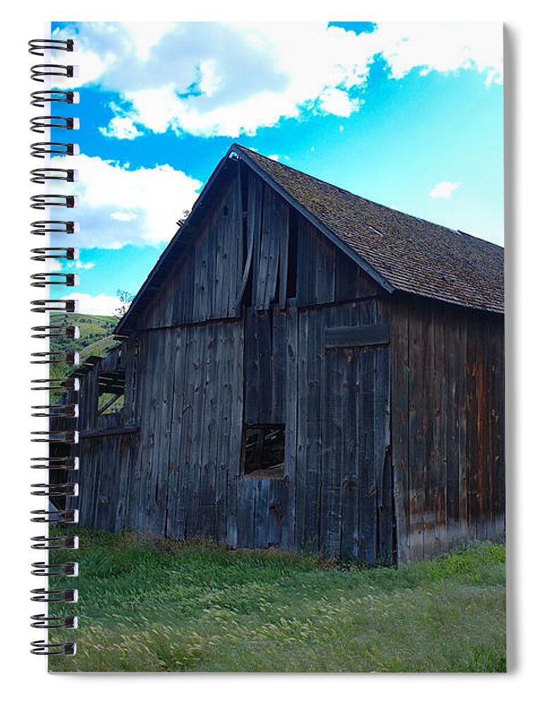 Barns Spiral Notebook featuring the photograph An old barn in the sage by Jeff Swan