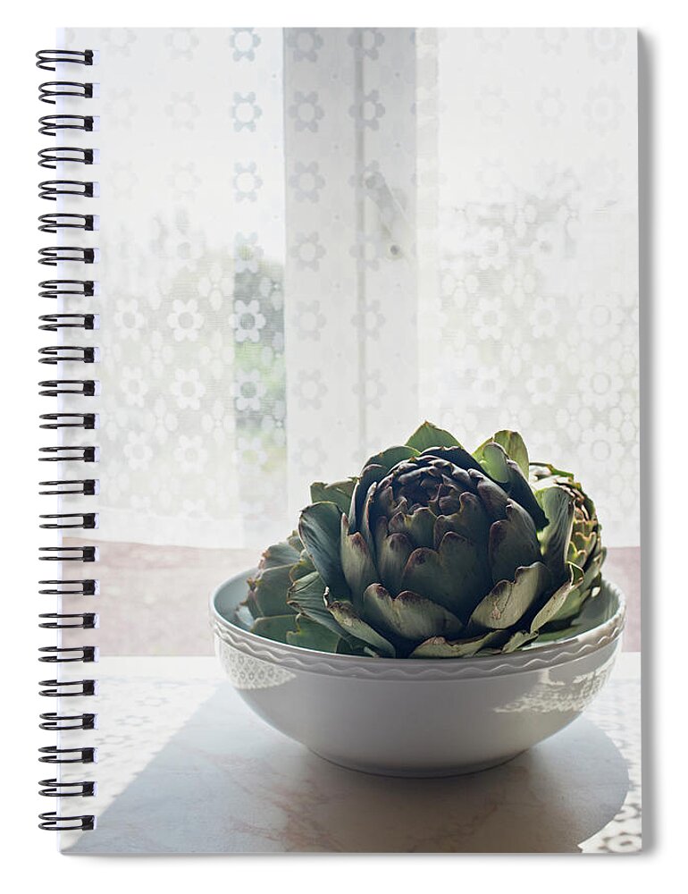 Home Interior Spiral Notebook featuring the photograph Artichoke In A Bowl On Sunlit Windowsill by Kathleen Finlay