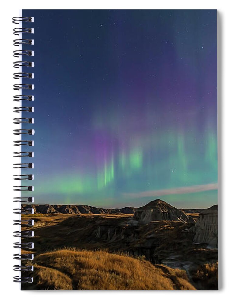 Tranquility Spiral Notebook featuring the photograph Aurora Borealis Over The Badlands Of by Alan Dyer/stocktrek Images