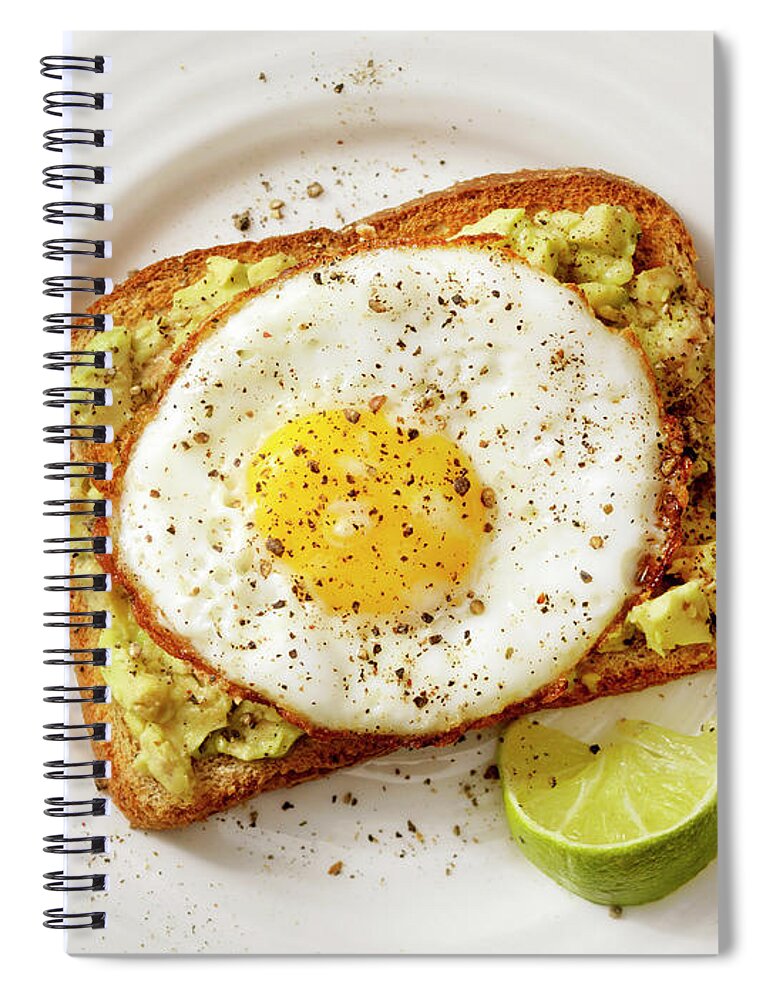 Breakfast Spiral Notebook featuring the photograph Avocado Toast With A Fried Egg by Lauripatterson
