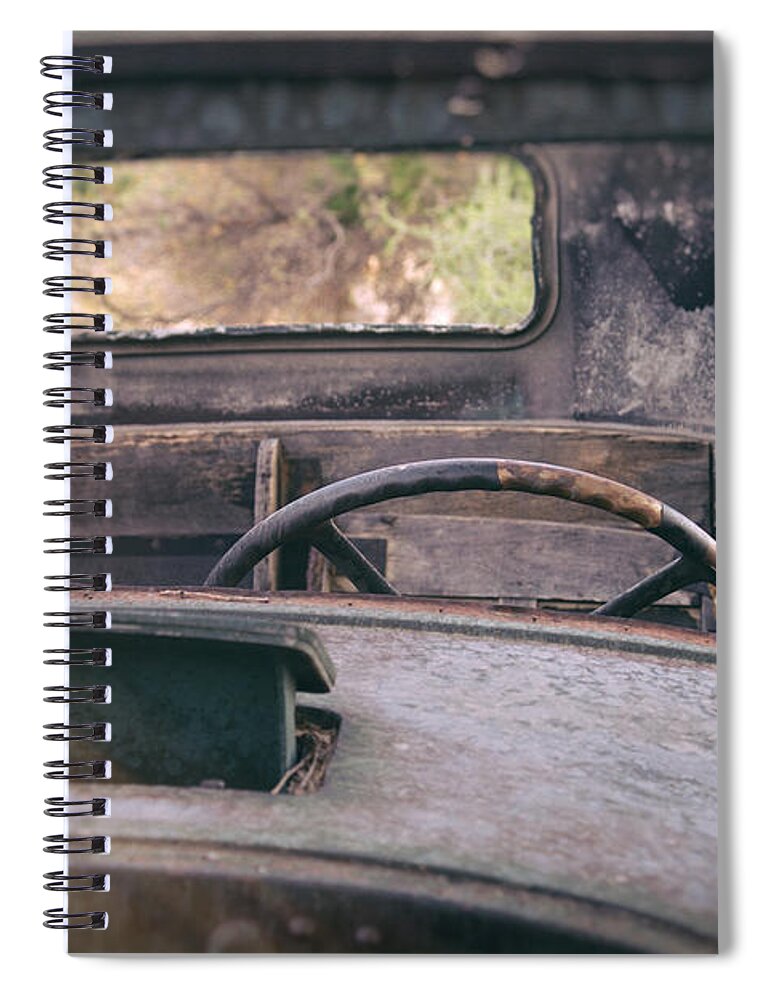 Abandoned Spiral Notebook featuring the photograph Behind the Wheel by Peter Tellone