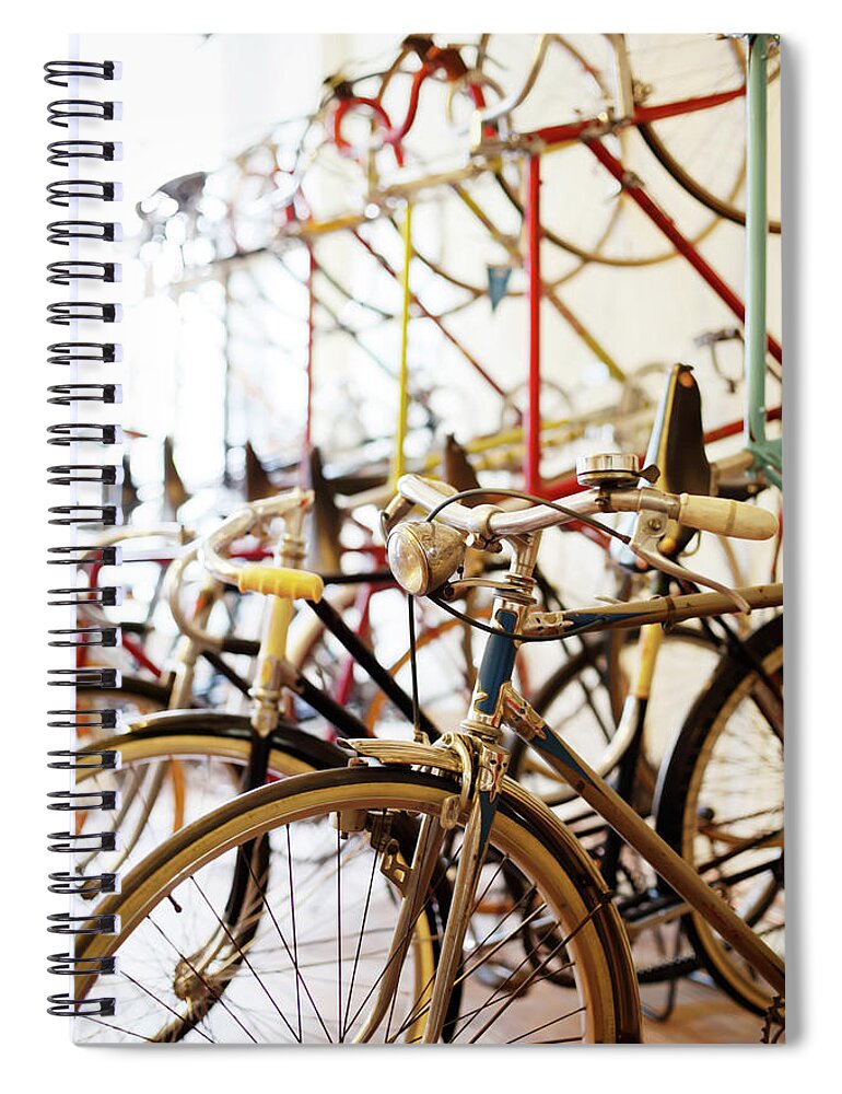 Berlin Spiral Notebook featuring the photograph Bicycles Parked In A Bike Shop by Alvarez