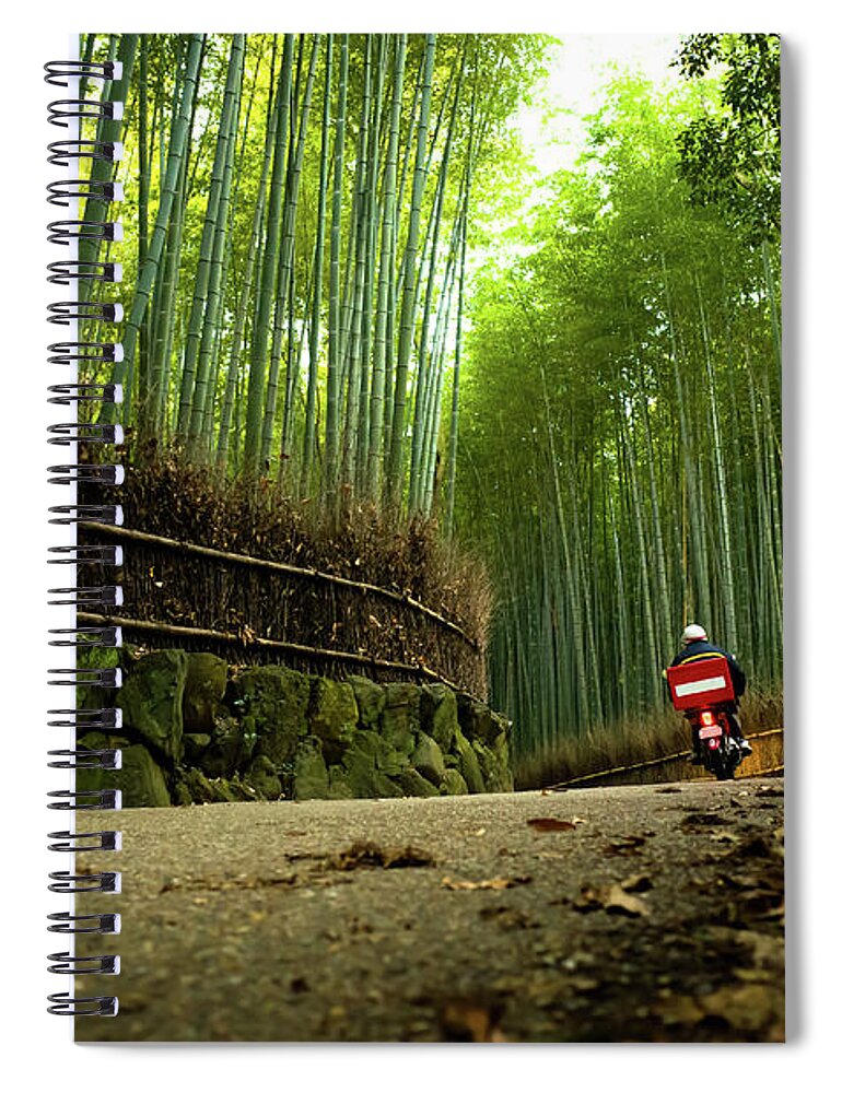 Crash Helmet Spiral Notebook featuring the photograph Bike Running Through Bamboo Grove by Marser