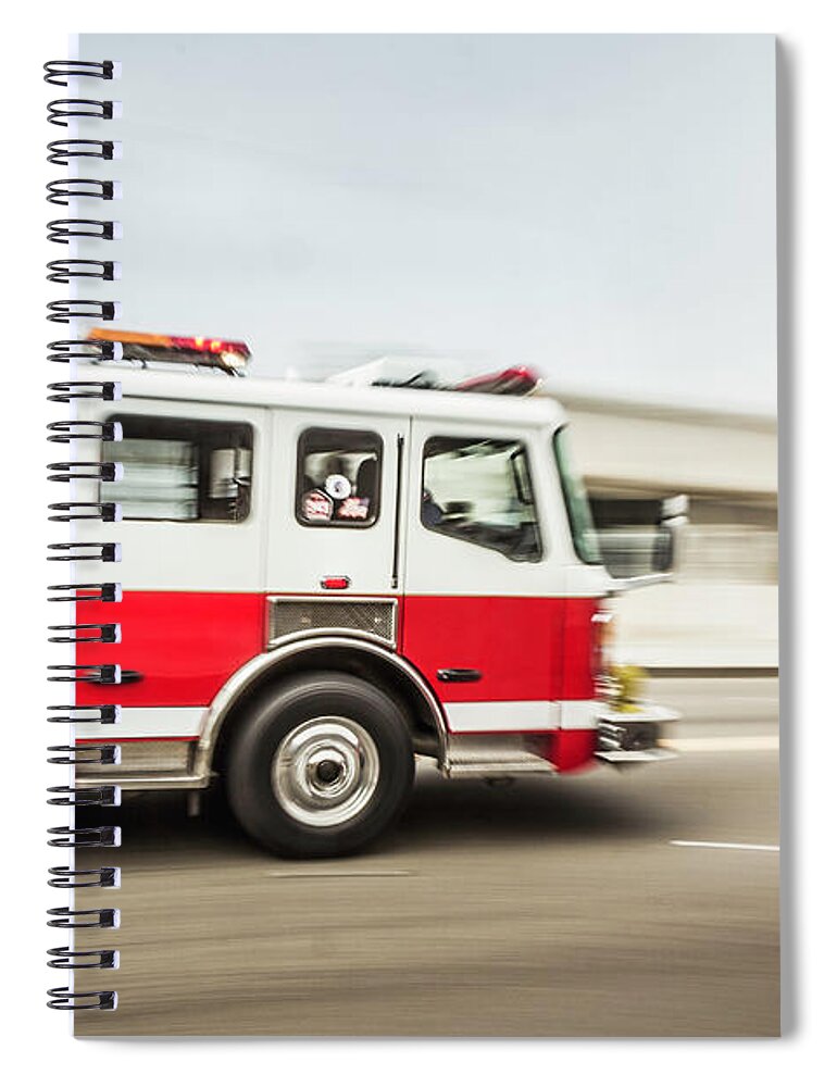 Working Spiral Notebook featuring the photograph Blurred Motion Shot Of Speeding Fire by Manuel Sulzer