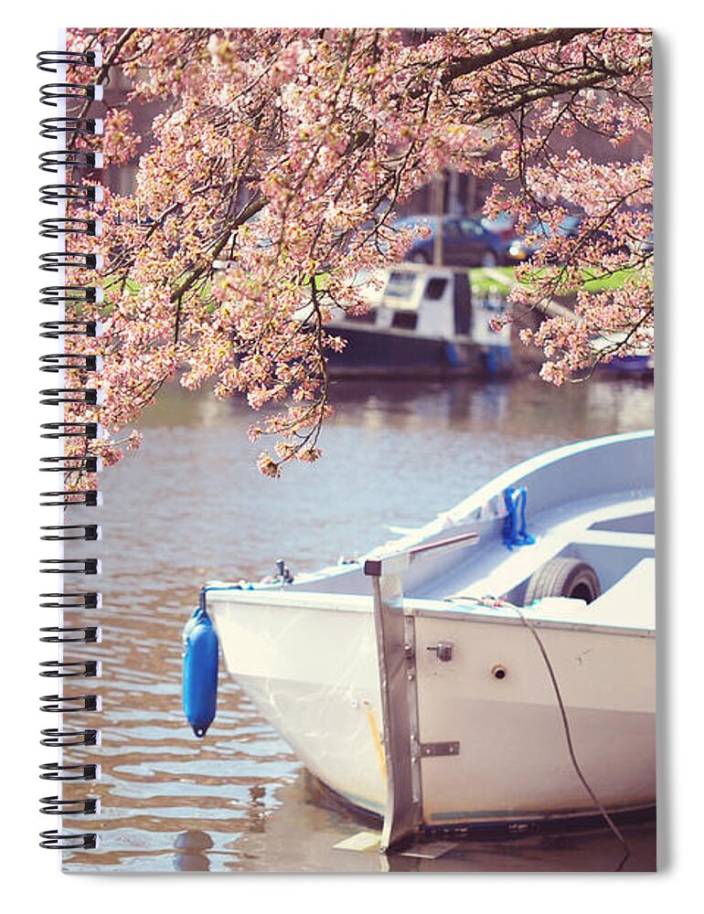 Spring Spiral Notebook featuring the photograph Boat Under Blooming Cherry Tree. Pink Spring in Amsterdam. by Jenny Rainbow