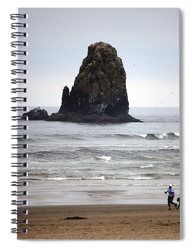 Cannon Beach Spiral Notebook featuring the photograph Cannon Beach Run by Sharon Elliott