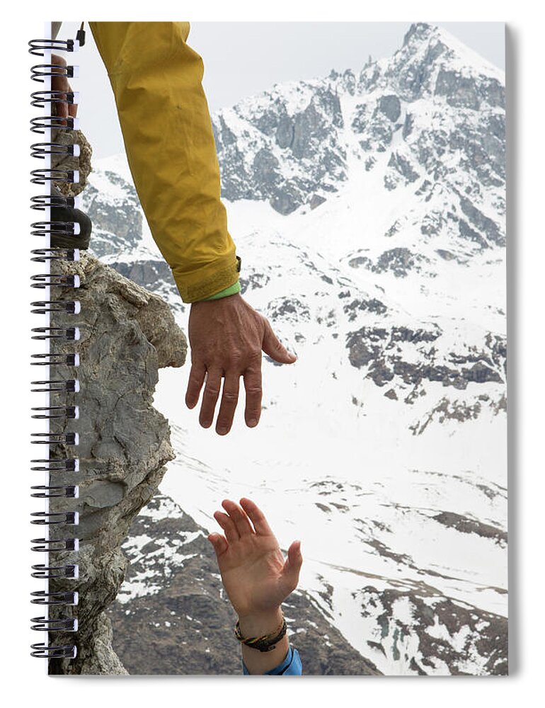 Young Men Spiral Notebook featuring the photograph Climber Offers Teammate A Helping Hand by Ascent Xmedia