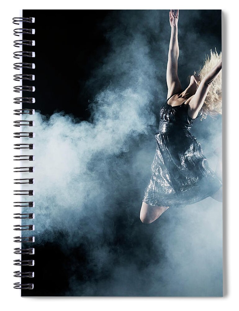 Human Arm Spiral Notebook featuring the photograph Dancer Leaping Through Smoke by Henrik Sorensen