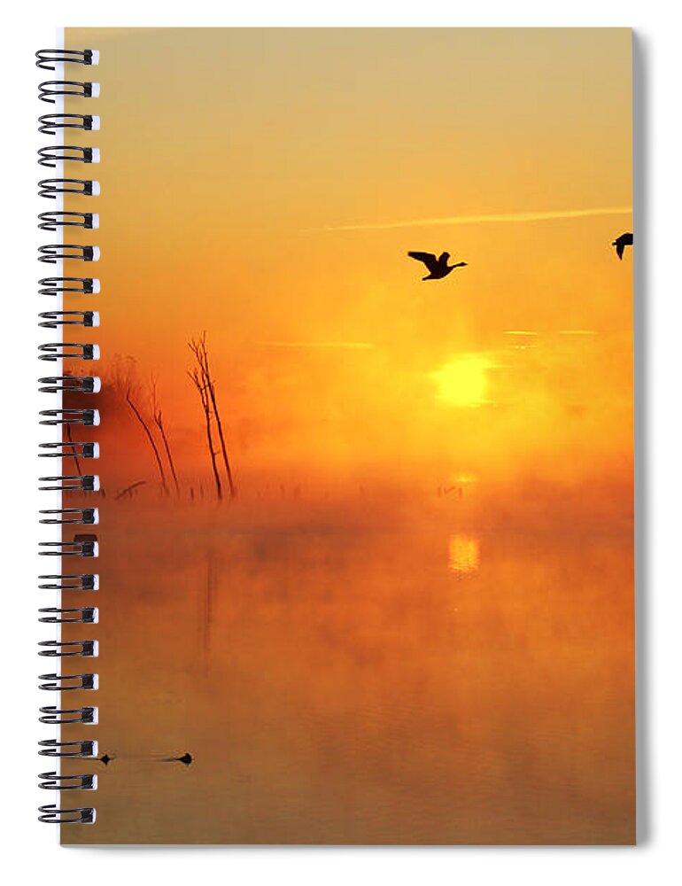 Sunrise Spiral Notebook featuring the photograph Flight at Sunrise by Roger Becker