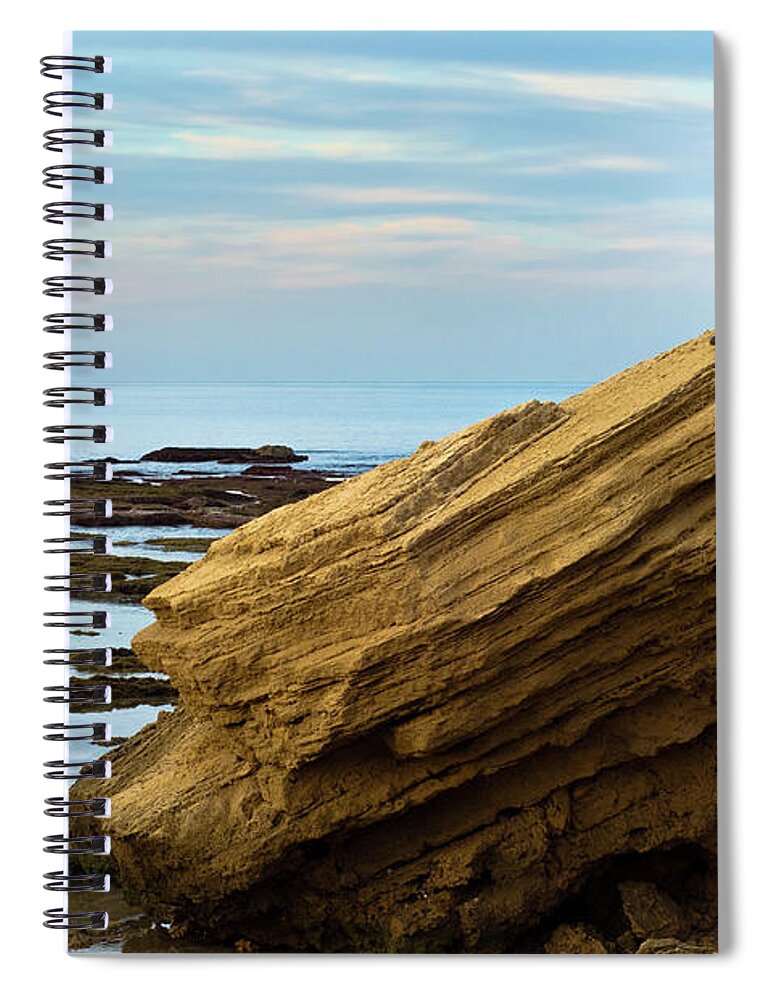 Child Spiral Notebook featuring the photograph Girl Sitting On A Rock By The Sea by Ilan Shacham