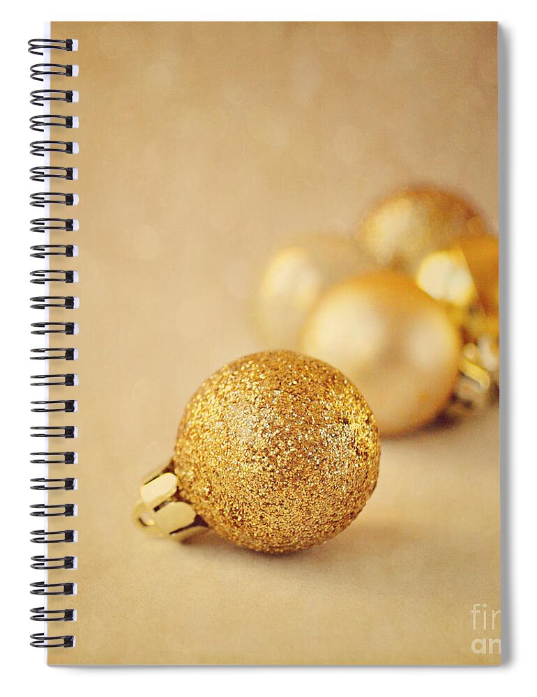 Baubles Spiral Notebook featuring the photograph Gold glittery Christmas baubles by Lyn Randle