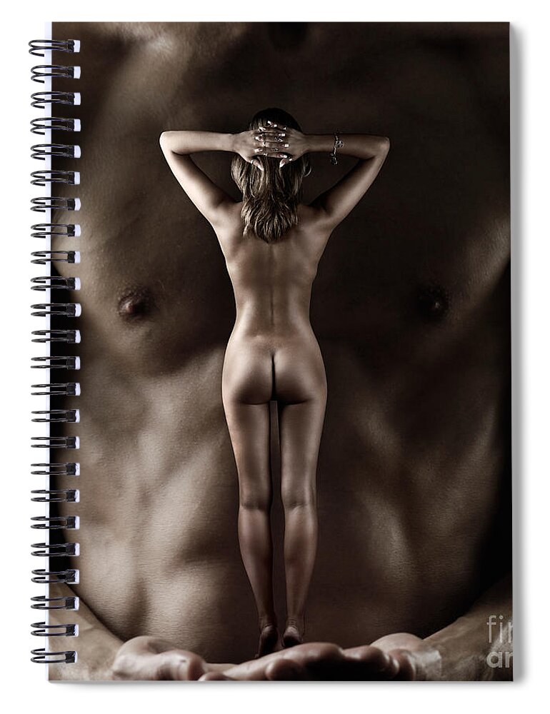 Nude Spiral Notebook featuring the photograph Man Holding a Naked Fitness Woman in His Hands by Maxim Images Exquisite Prints