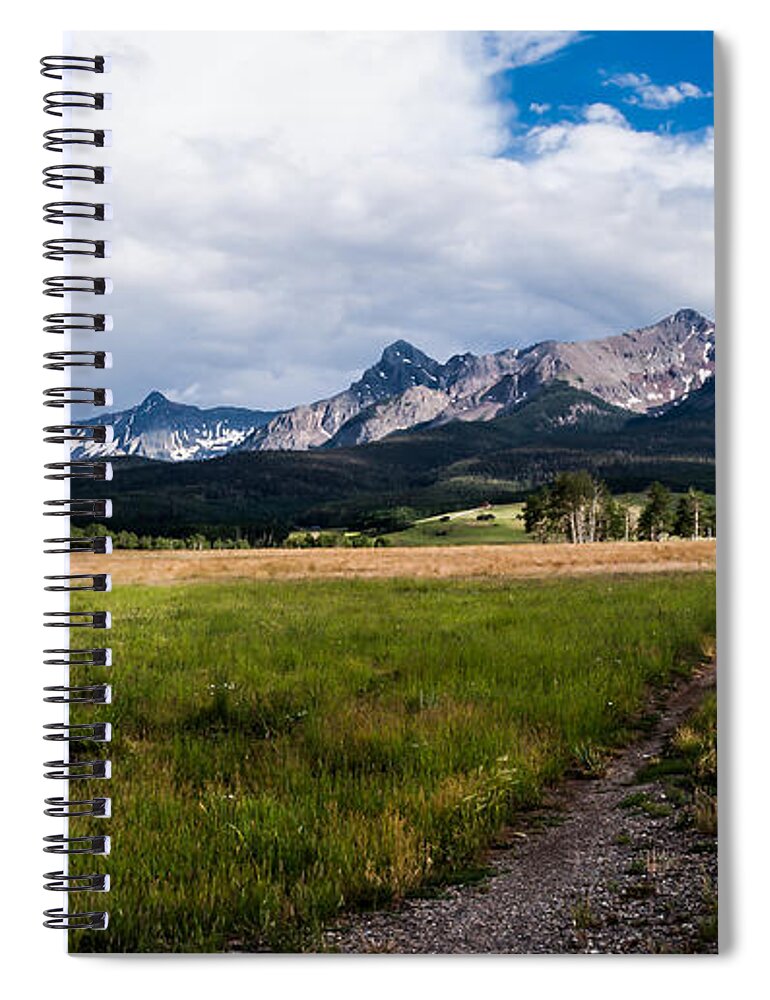 Jay Stockhaus Spiral Notebook featuring the photograph Mountains and Fence by Jay Stockhaus
