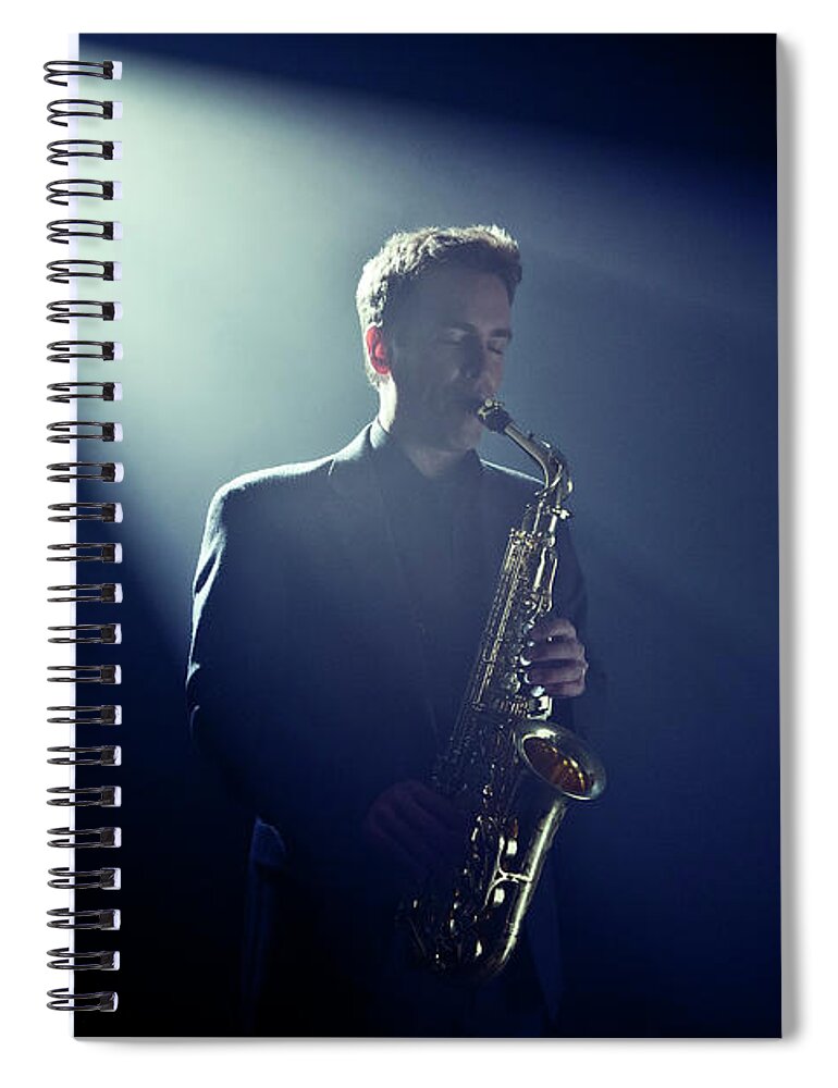 People Spiral Notebook featuring the photograph Musician Playing Saxophone On Stage by Tooga