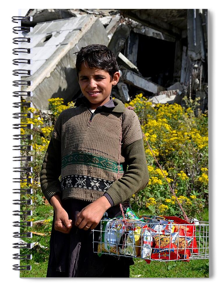 Boy Spiral Notebook featuring the photograph Pakistani boy in front of hotel ruins in Swat Valley by Imran Ahmed