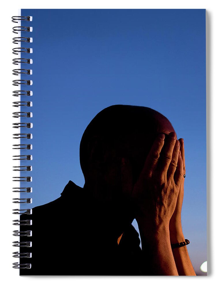 Mature Adult Spiral Notebook featuring the photograph Portrait Of Man Covering Face With by Maciej Toporowicz, Nyc