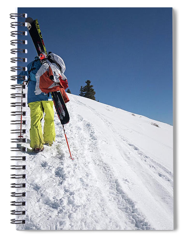 Ski Pole Spiral Notebook featuring the photograph Pro Skier Hiking Up The Mountain by Daniel Milchev