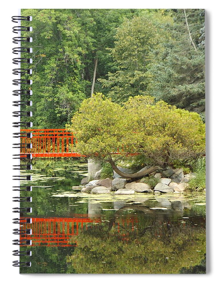 Red Spiral Notebook featuring the photograph Red Bridge Reflection in a Pond by Erick Schmidt